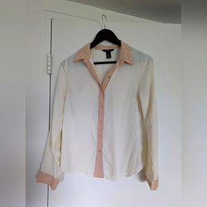 White shirt with pink detailing